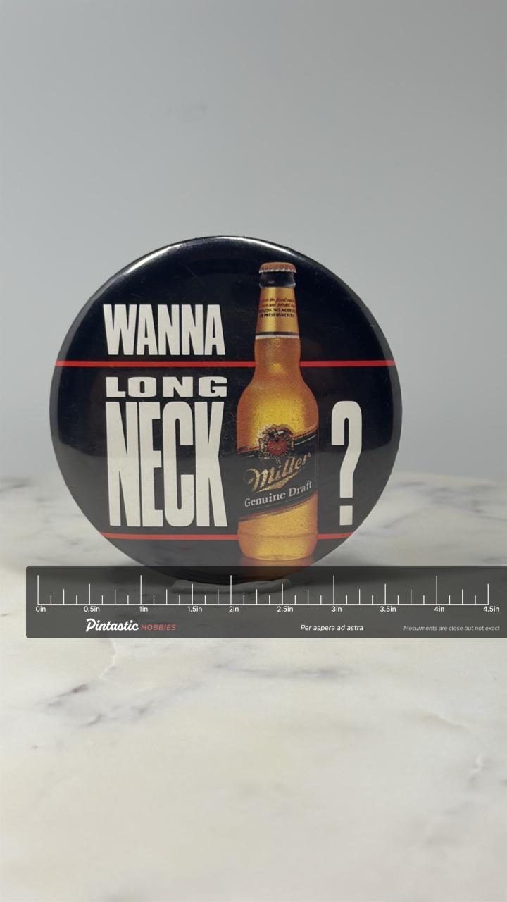 Miller Genuine Draft Advertising Button Pin: Black Glossy - 1990s Beer Promo Accessory with ruler overlay for size reference