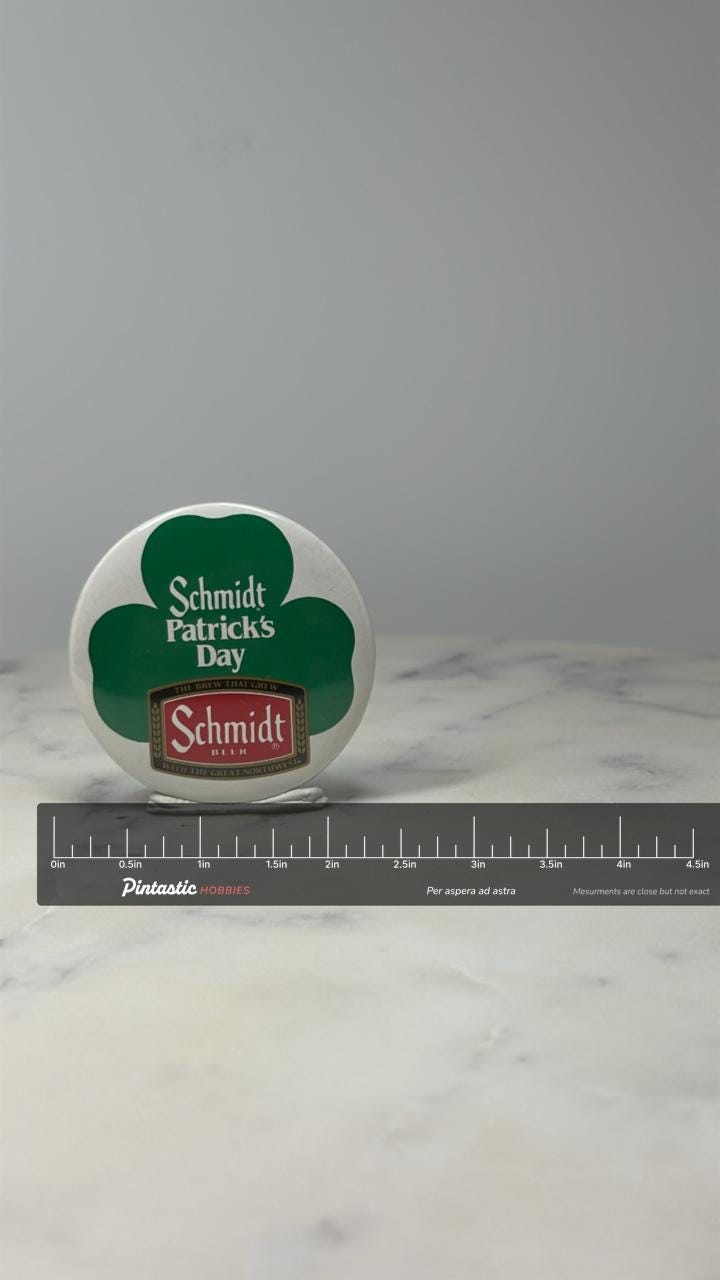 Schmidt St Patrick's Day Pin: Green Shamrock - Beer Promo Accessory with ruler overlay for size reference