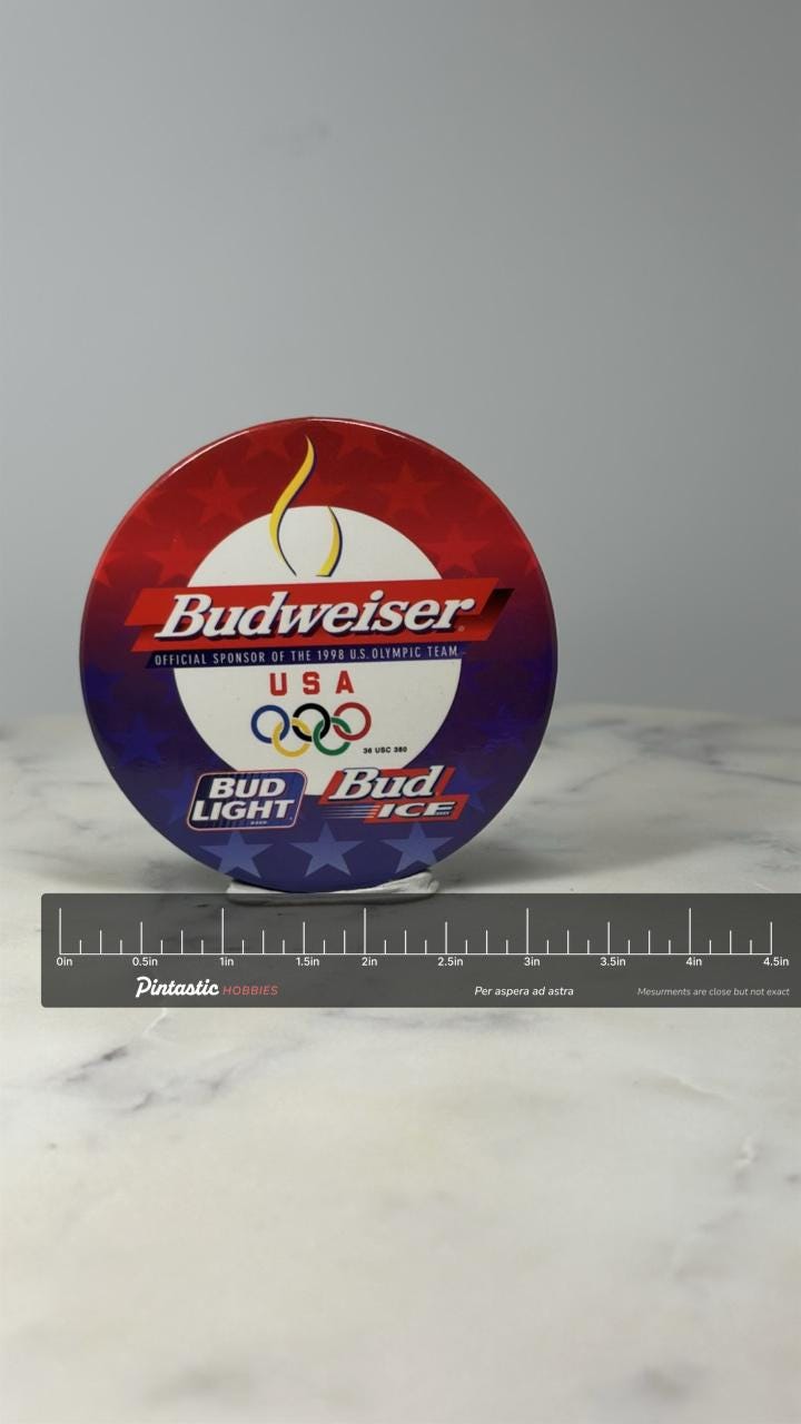 Budweiser Olympic Button Pin: Red White Blue - 1998 USA Sponsor Accessory with ruler overlay for size reference