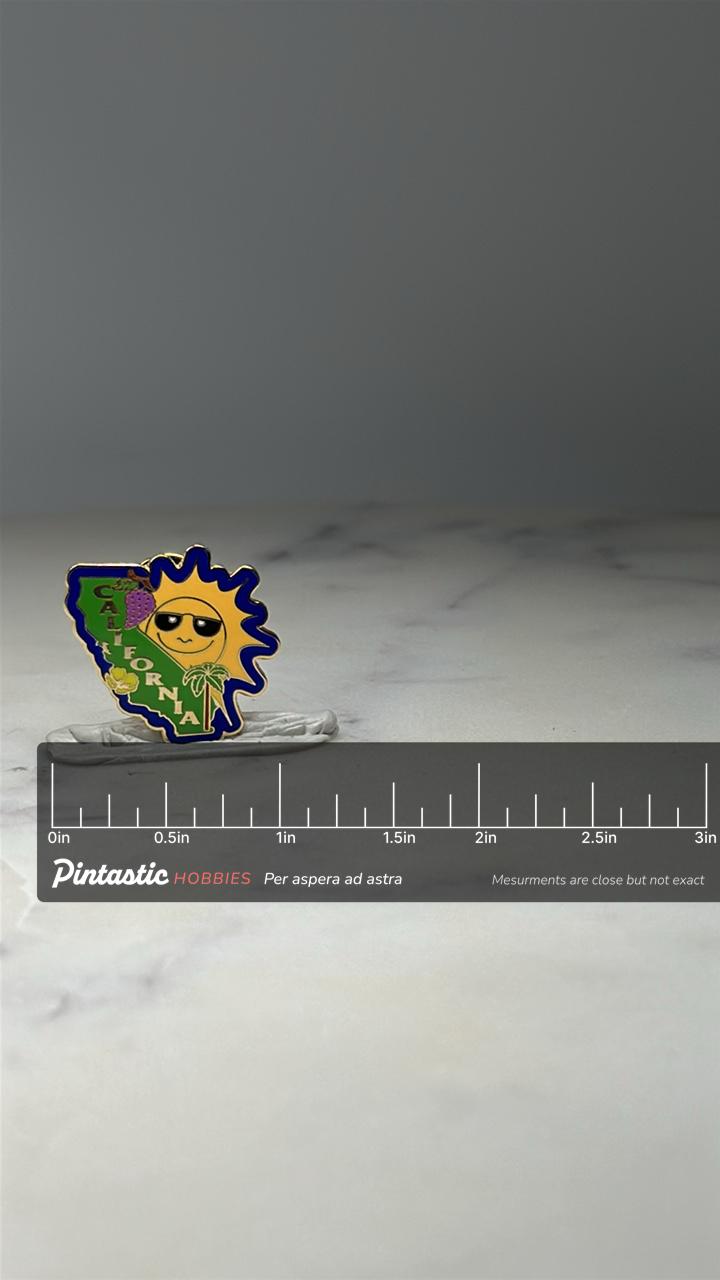 California State Souvenir Pin: Gold Tone Enamel - Retro Travel Accessory with ruler overlay for size reference