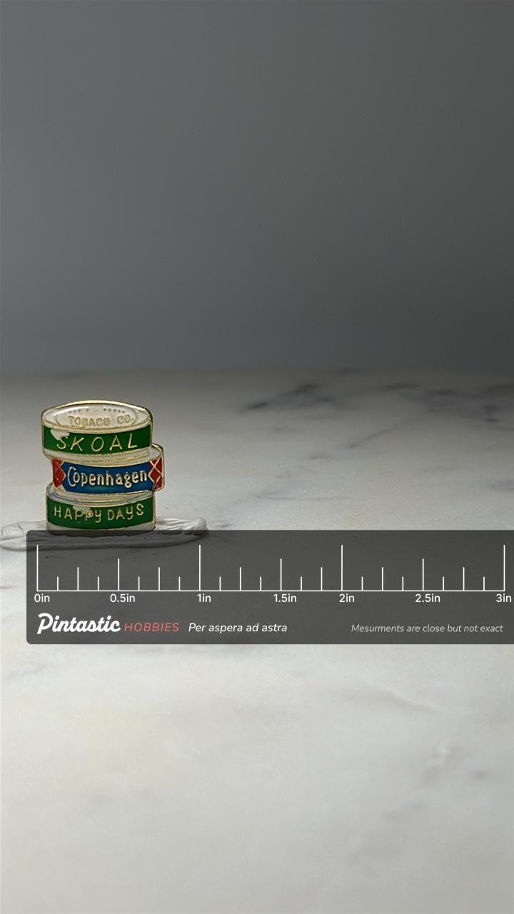 Skoal Copenhagen Tobacco Pin: Enamel Stack Design - 1990s Promo Accessory with ruler overlay for size reference
