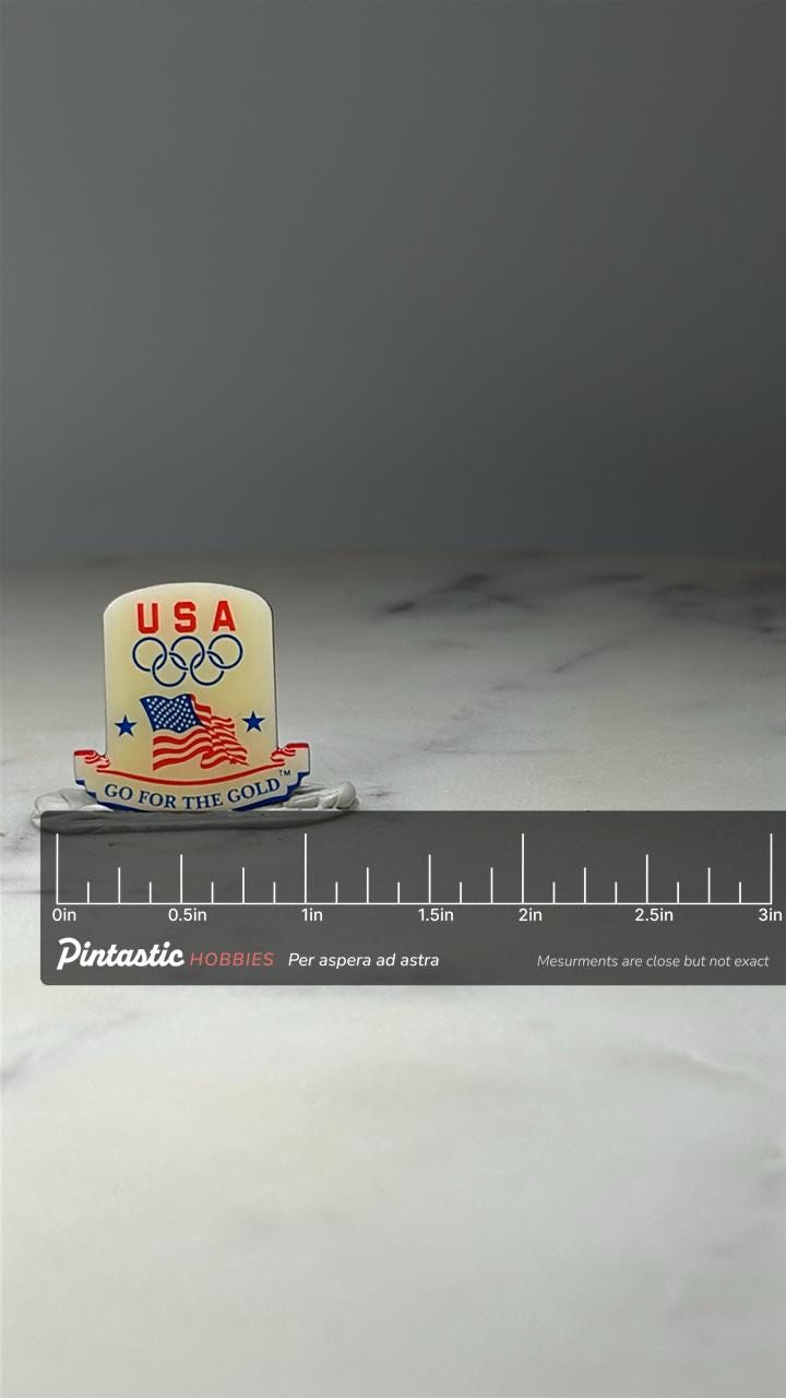USA Olympic Lapel Pin: Enamel Patriotic - Go for Gold Accessory with ruler overlay for size reference