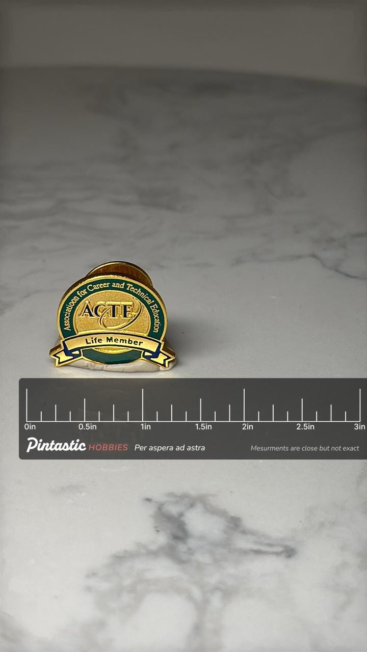 ACTE Life Member Lapel Pin: Gold & Green Enamel - Education with ruler overlay for size reference