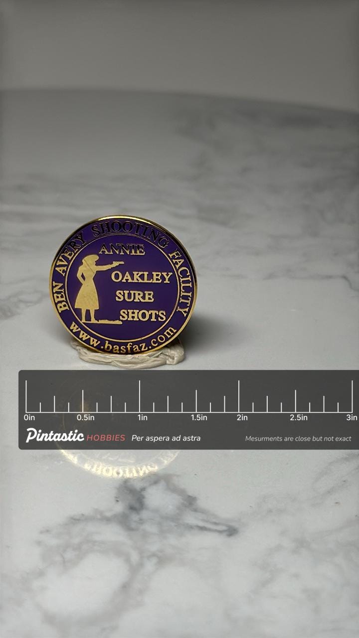 Annie Oakley Sure Shots Enamel Pin: Purple Gold - Shooting Range Accessory with ruler overlay for size reference