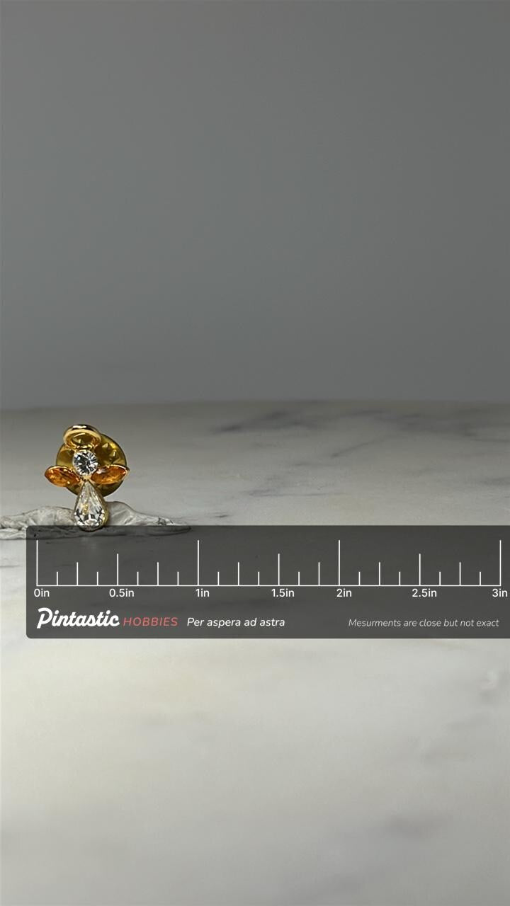 Angel Rhinestone Pin: Gold Tone & Amber - Vintage Religious Accessory with ruler overlay for size reference
