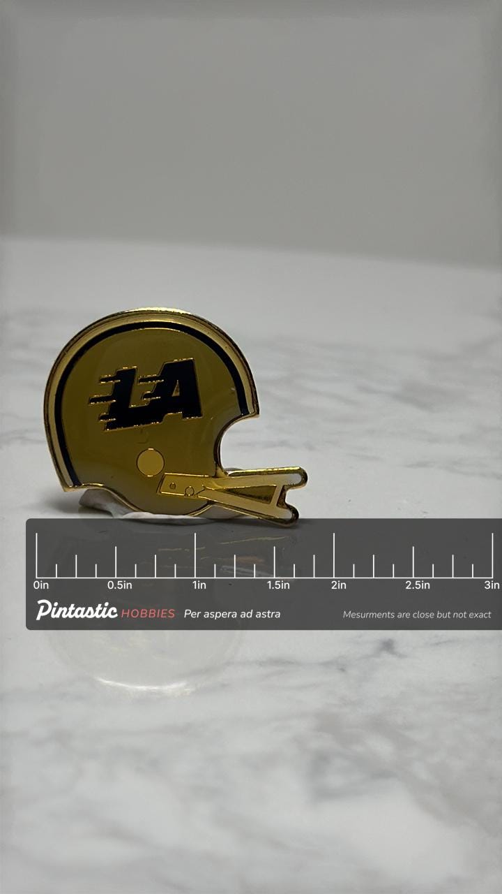 LA Football Helmet Pin: Gold Tone Enamel - Vintage Sports Accessory with ruler overlay for size reference