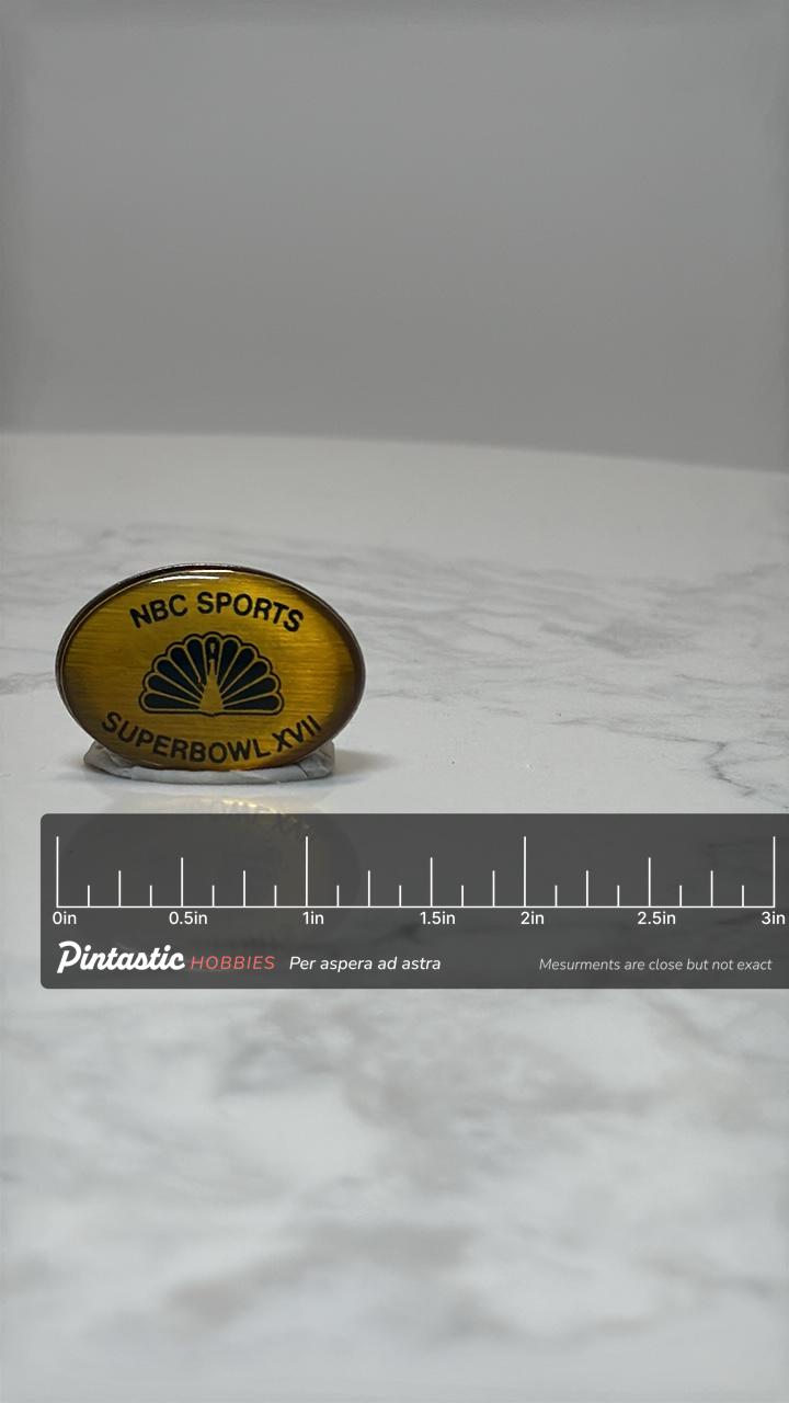 NBC Sports Super Bowl XVII Pin: Amber Enamel Oval - 1980s Sport Accessory with ruler overlay for size reference