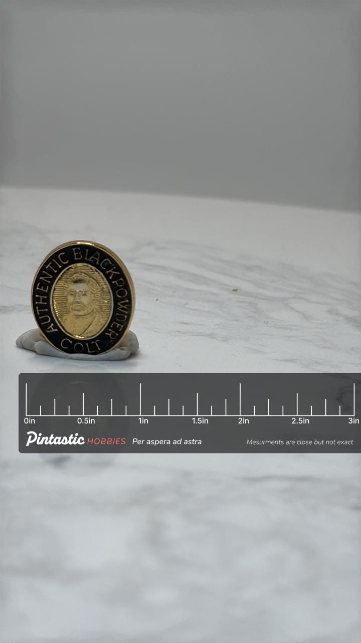 Colt Blackpowder Pin: Gold & Black Enamel - Western Collector Accessory with ruler overlay for size reference