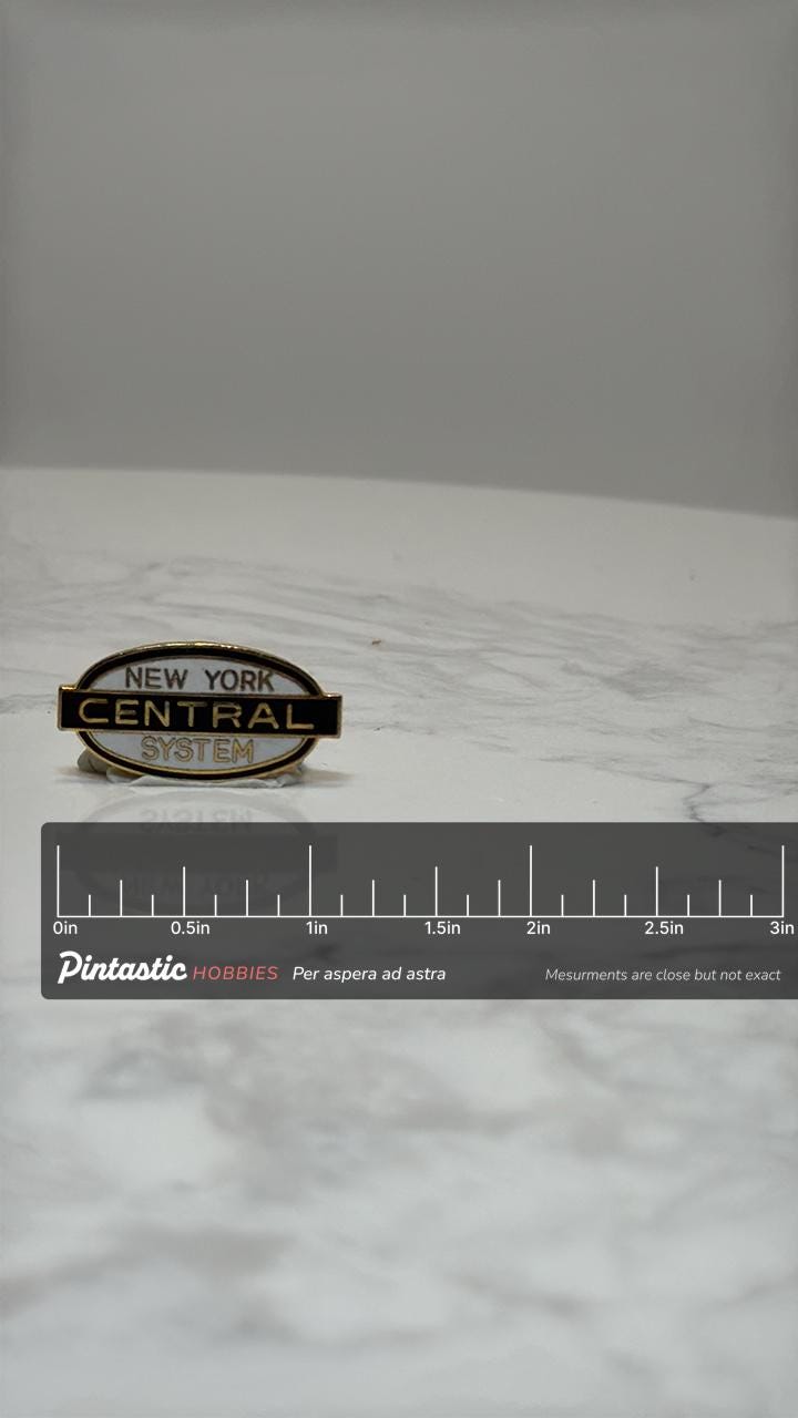 New York Central System Pin: Black & Gold Enamel - Vintage Railroad Accessory with ruler overlay for size reference
