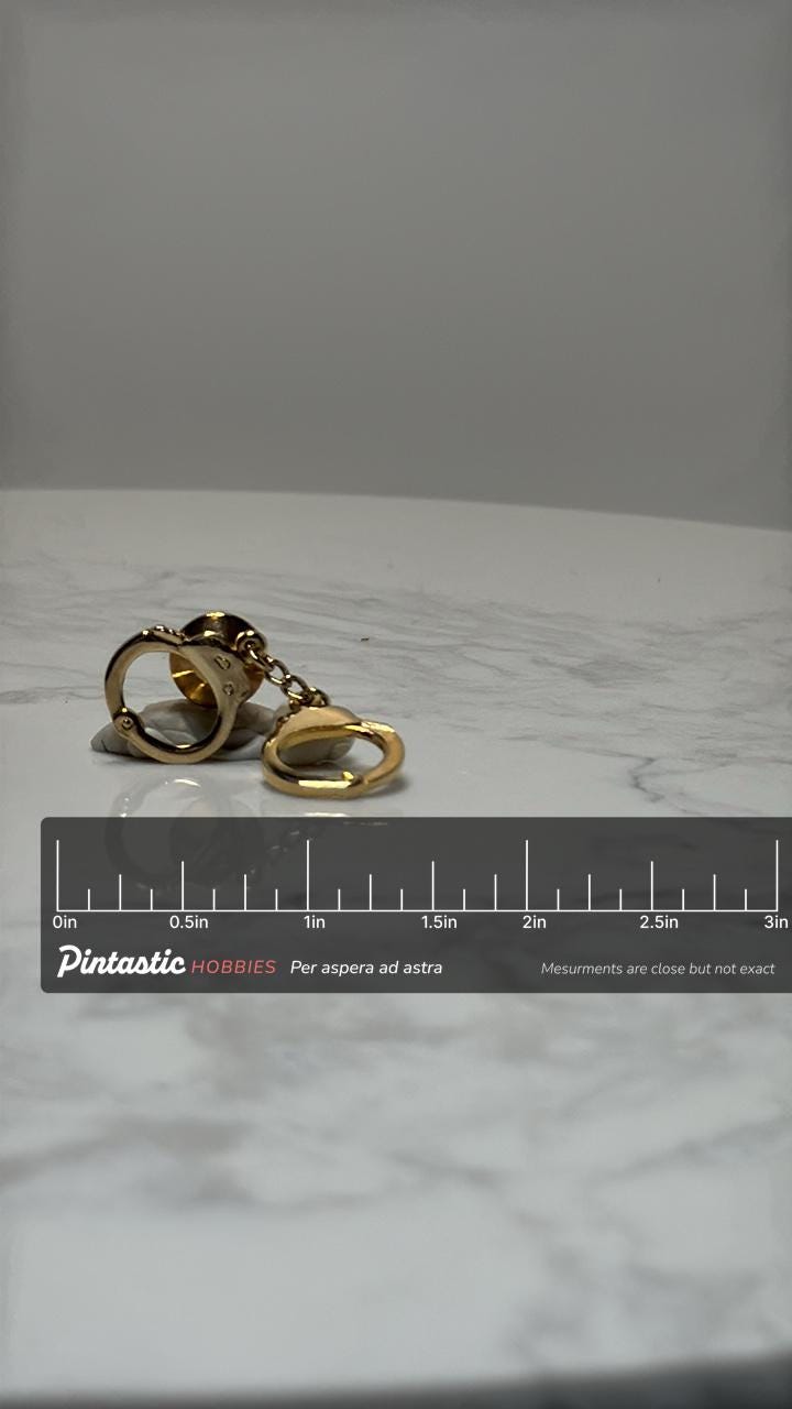 Handcuffs Novelty Pin: Gold-Tone Chain Design - Retro Accessory with ruler overlay for size reference