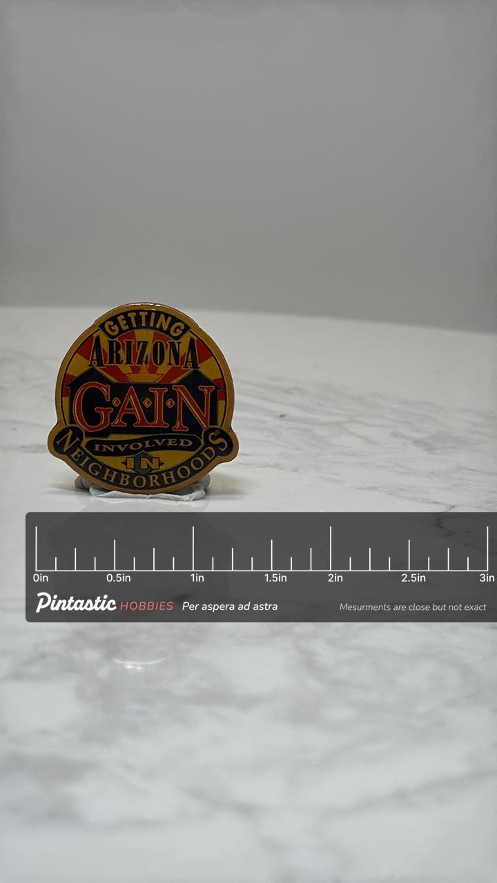 Arizona G.A.I.N. Lapel Pin: Red & Gold Enamel - Community Safety Accessory with ruler overlay for size reference