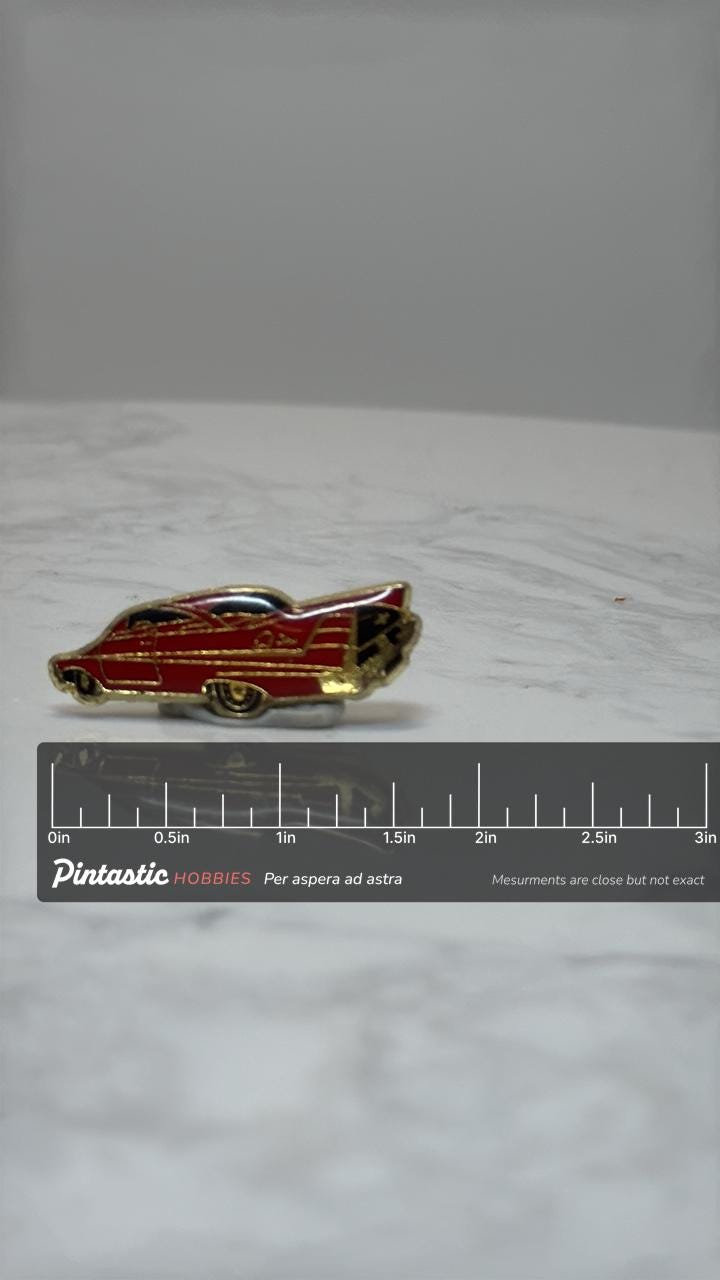 1959 Impala Style Pin: Red Classic 50s Tailfin Enamel Car Pin with ruler overlay for size reference