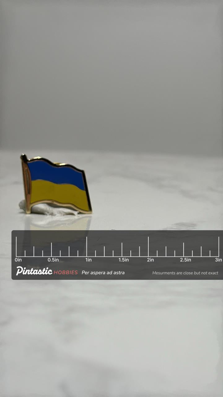 Ukraine Flag Pin: Gold Enamel - Patriotic Accessory with ruler overlay for size reference