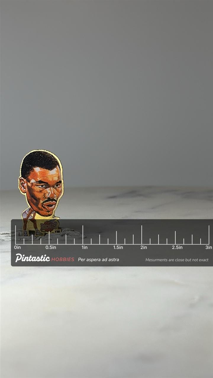 Vintage Hakeem Olajuwon Pinheads Pin: Houston Rockets NBA Lapel Pin – 90s Basketball Collectible with ruler overlay for size 