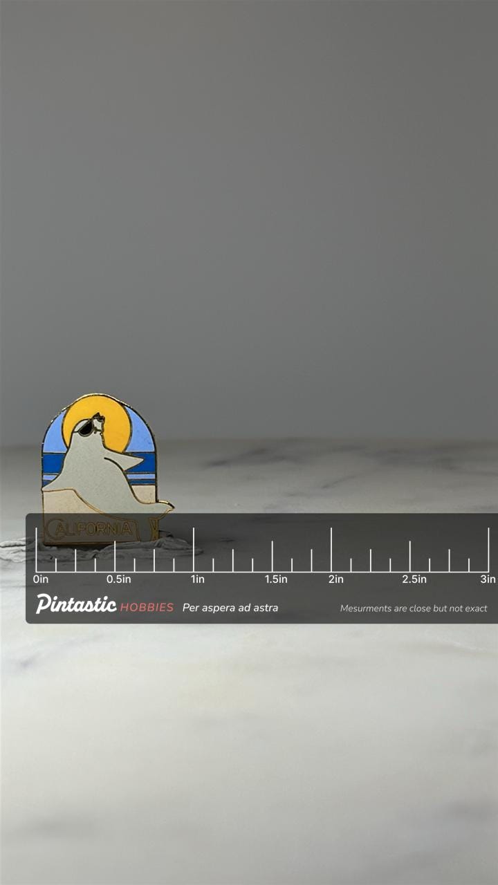 California Sea Lion Enamel Pin: Gold Tone - Coastal Souvenir Accessory with ruler overlay for size reference