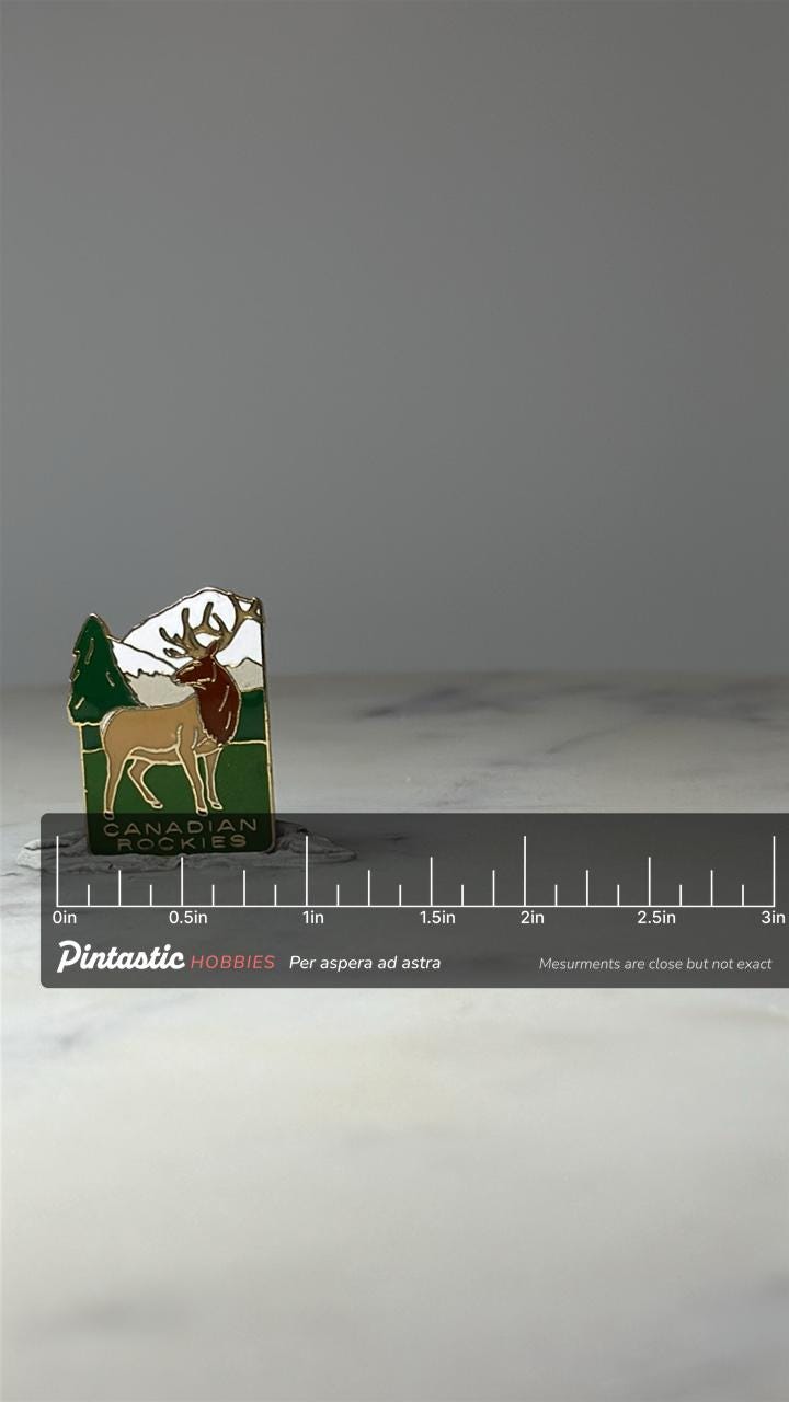 Canadian Rockies Elk Enamel Pin: Green Scenic - Travel Souvenir with ruler overlay for size reference