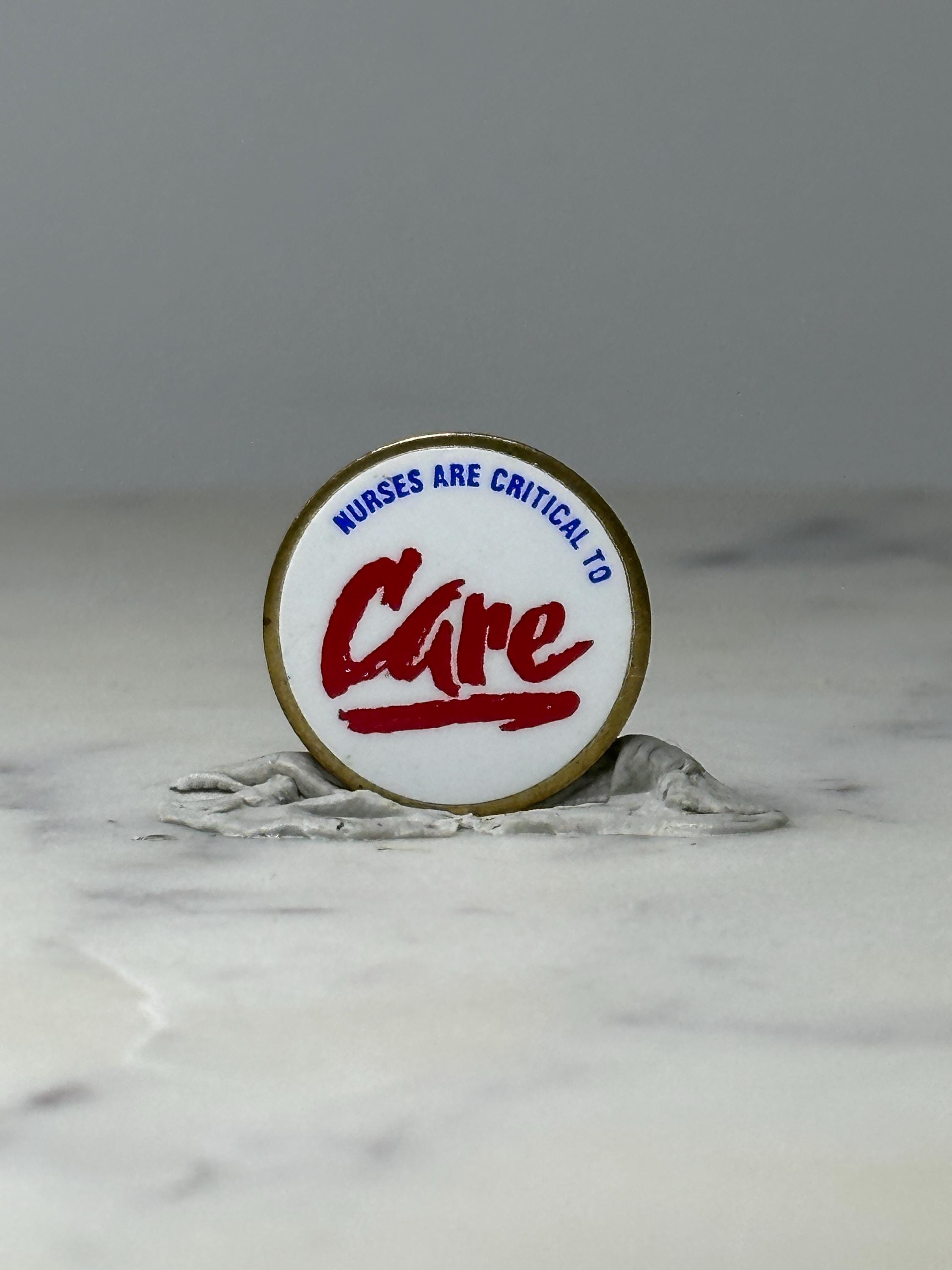 Vintage Nurses Are Critical to Care Enamel Pin: Red White Blue - Medical Theme Accessory