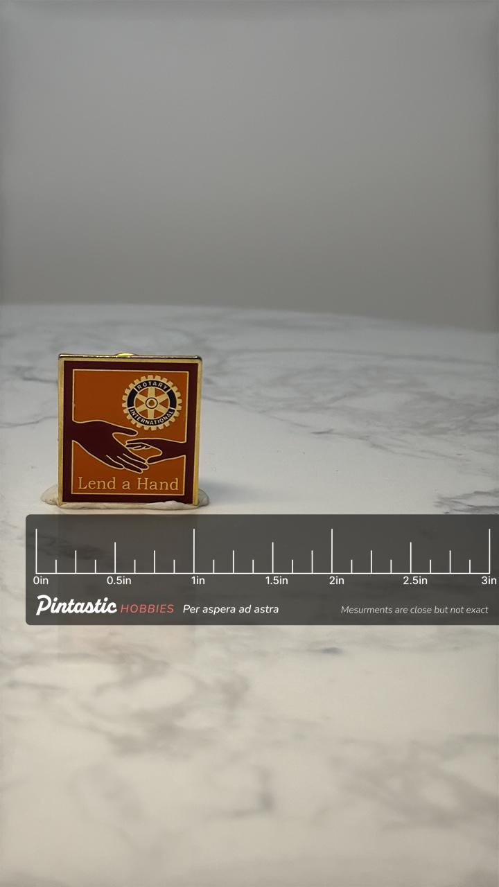 Vintage Rotary International Enamel Pin: Red Gold Lend a Hand - Club with ruler overlay for size reference