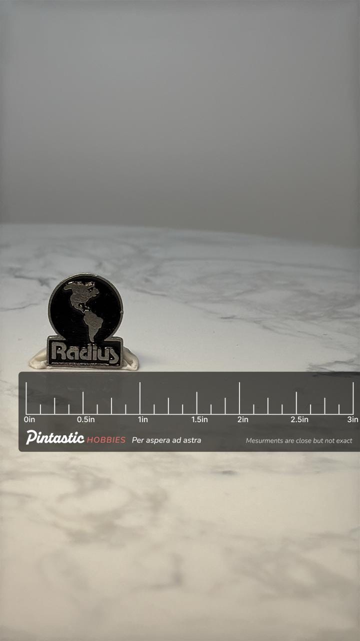 Vintage Radius Globe Logo Lapel Pin: Silver Tone Enamel - Travel Theme Accessory with ruler overlay for size reference