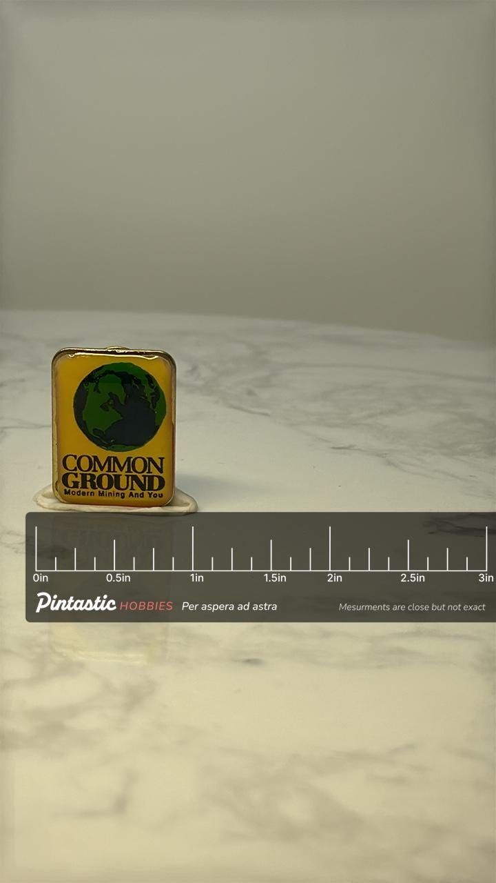 Vintage Common Ground Mining Enamel Pin: Gold Tone - 1970s Industry Accessory with ruler overlay for size reference