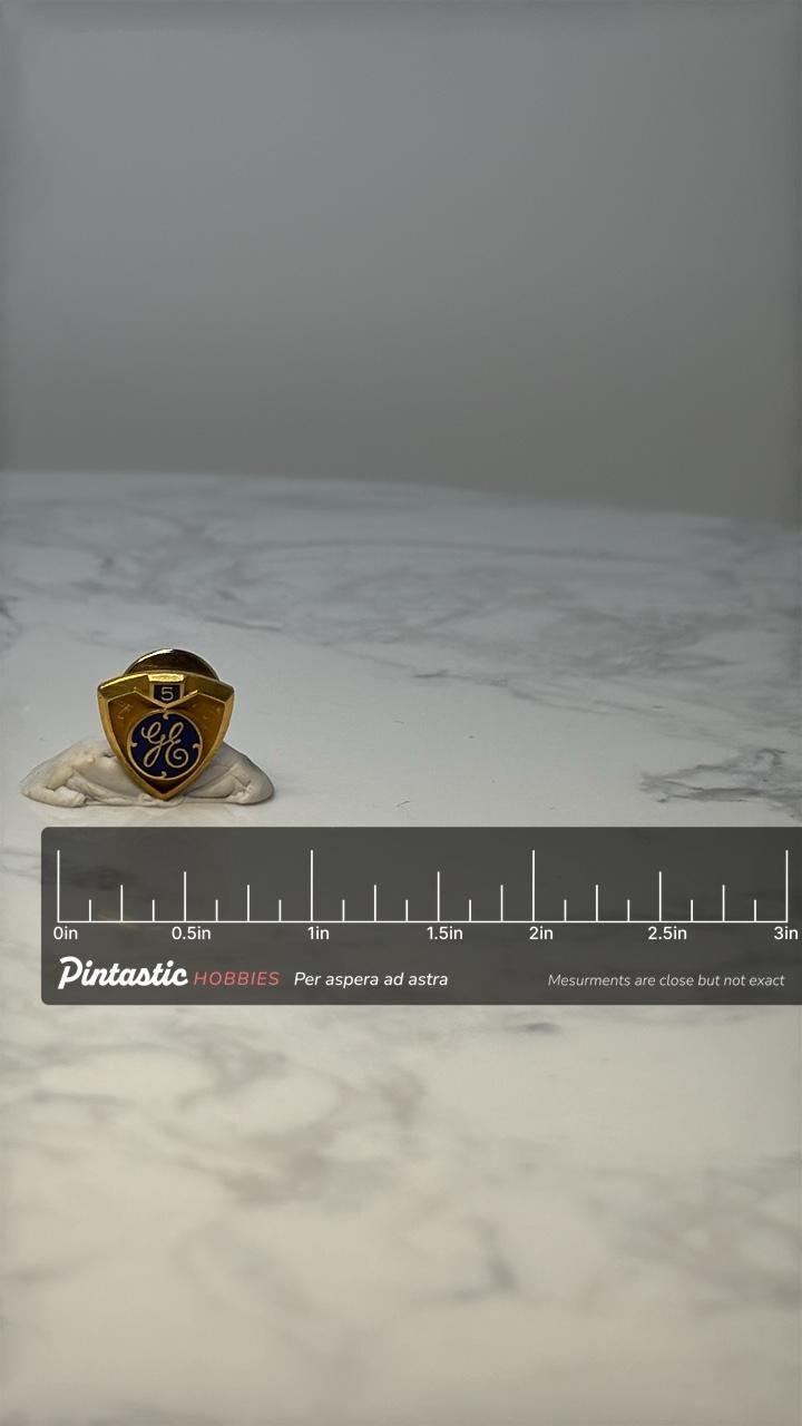 Vintage GE Shield 5 Year Pin: Gold Tone Enamel - Corporate Gift with ruler overlay for size reference