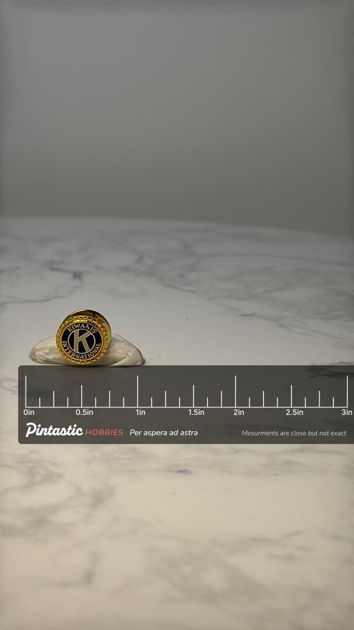 Vintage Kiwanis International Lapel Pin: Gold Tone Enamel - Service Club Accessory with ruler overlay for size reference