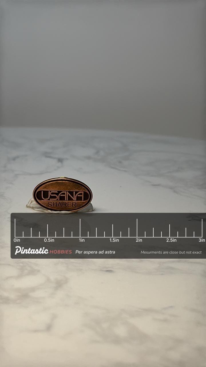 Vintage USANA Sharer Lapel Pin: Copper Tone Enamel - Company Award Accessory with ruler overlay for size reference