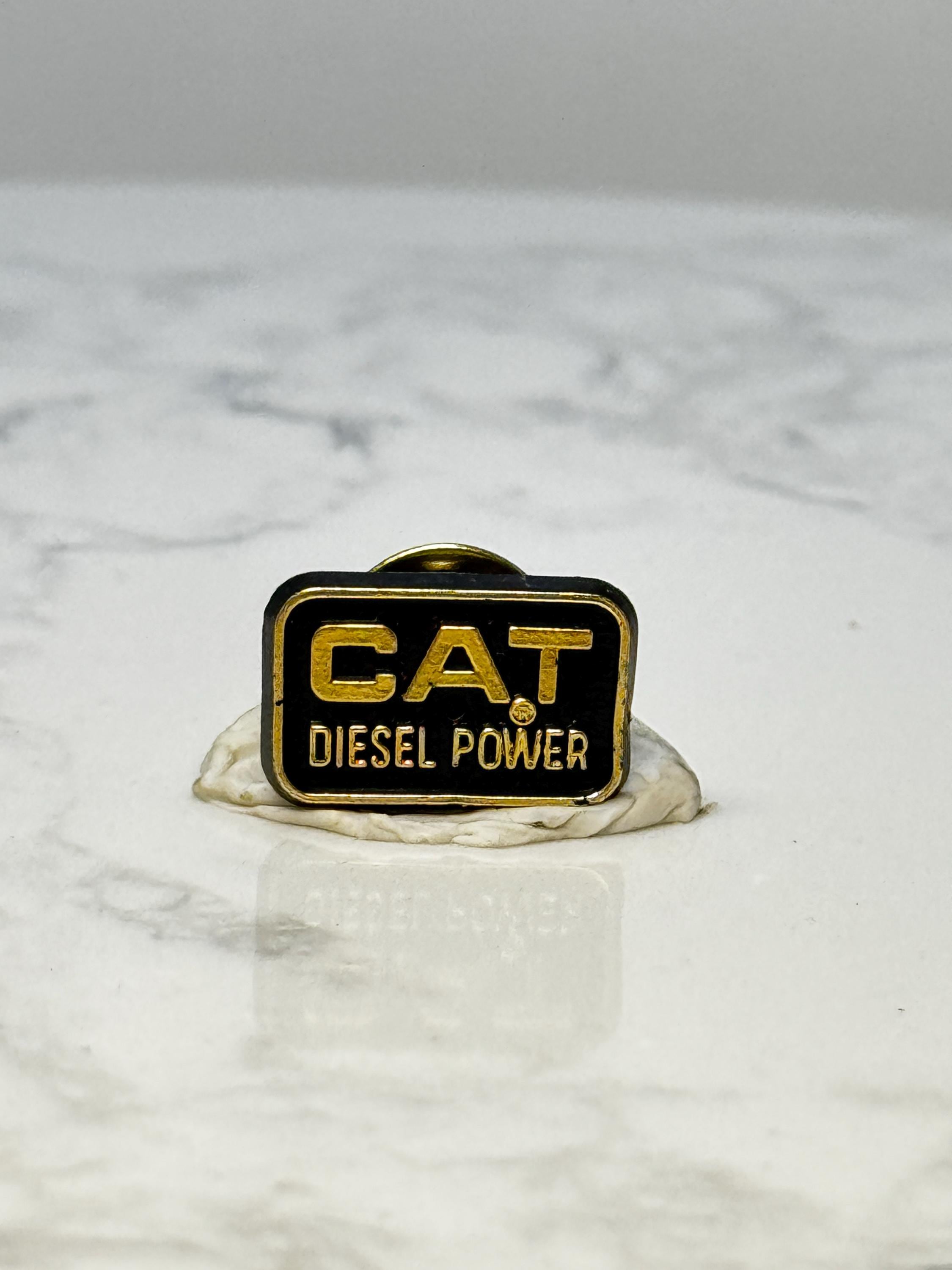 Vintage CAT Diesel Power Enamel Pin: Black & Gold - Tractor Era Accessory