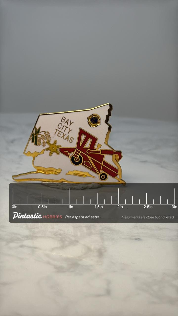 Vintage Bay City Texas Lions Club Pin: White Enamel - Lions Club Collectible with ruler overlay for size reference