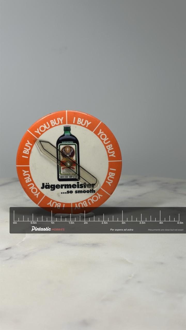 Jagermeister Advertising Spinner Pin: Orange White - Barware Promo Accessory with ruler overlay for size reference