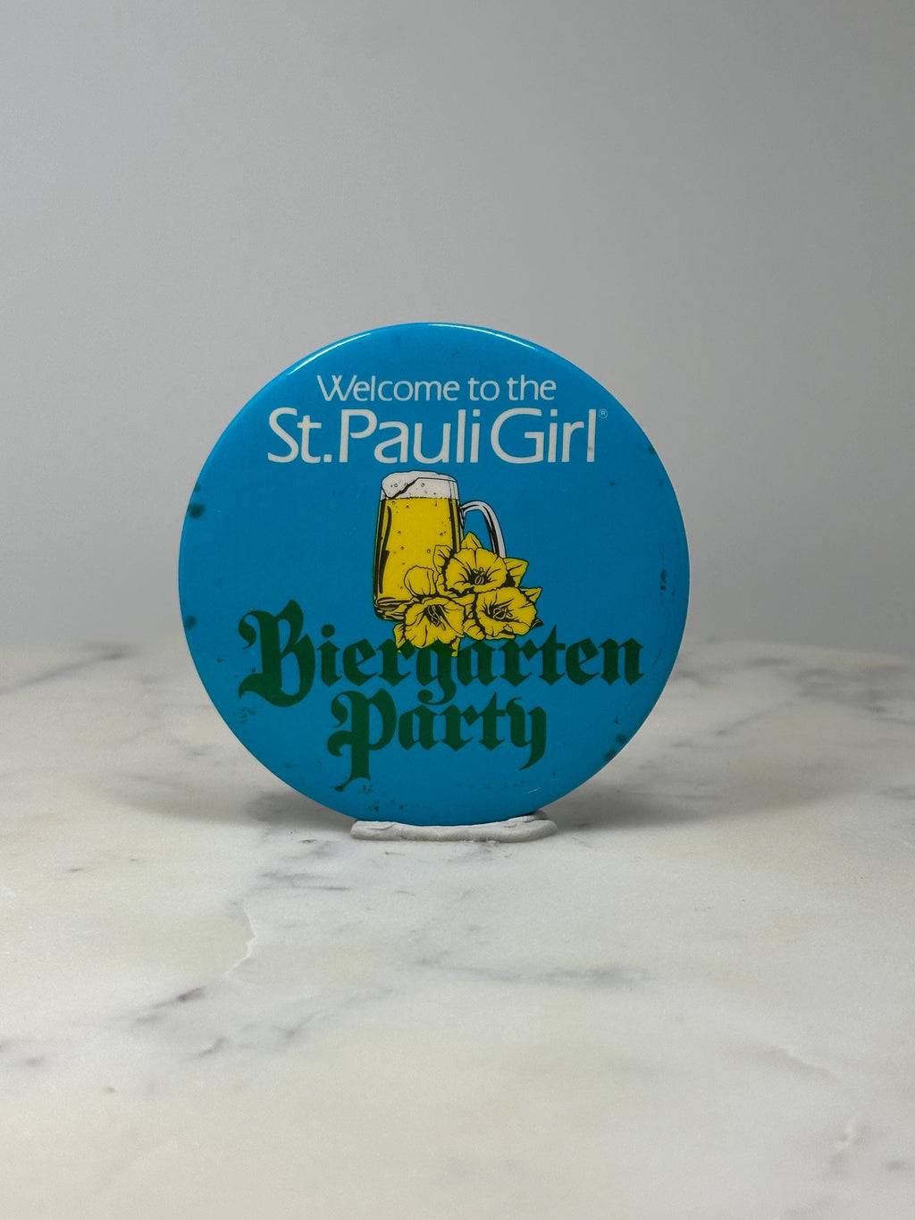 St Pauli Girl Beer Pin: Blue Metal Button - Biergarten Party
