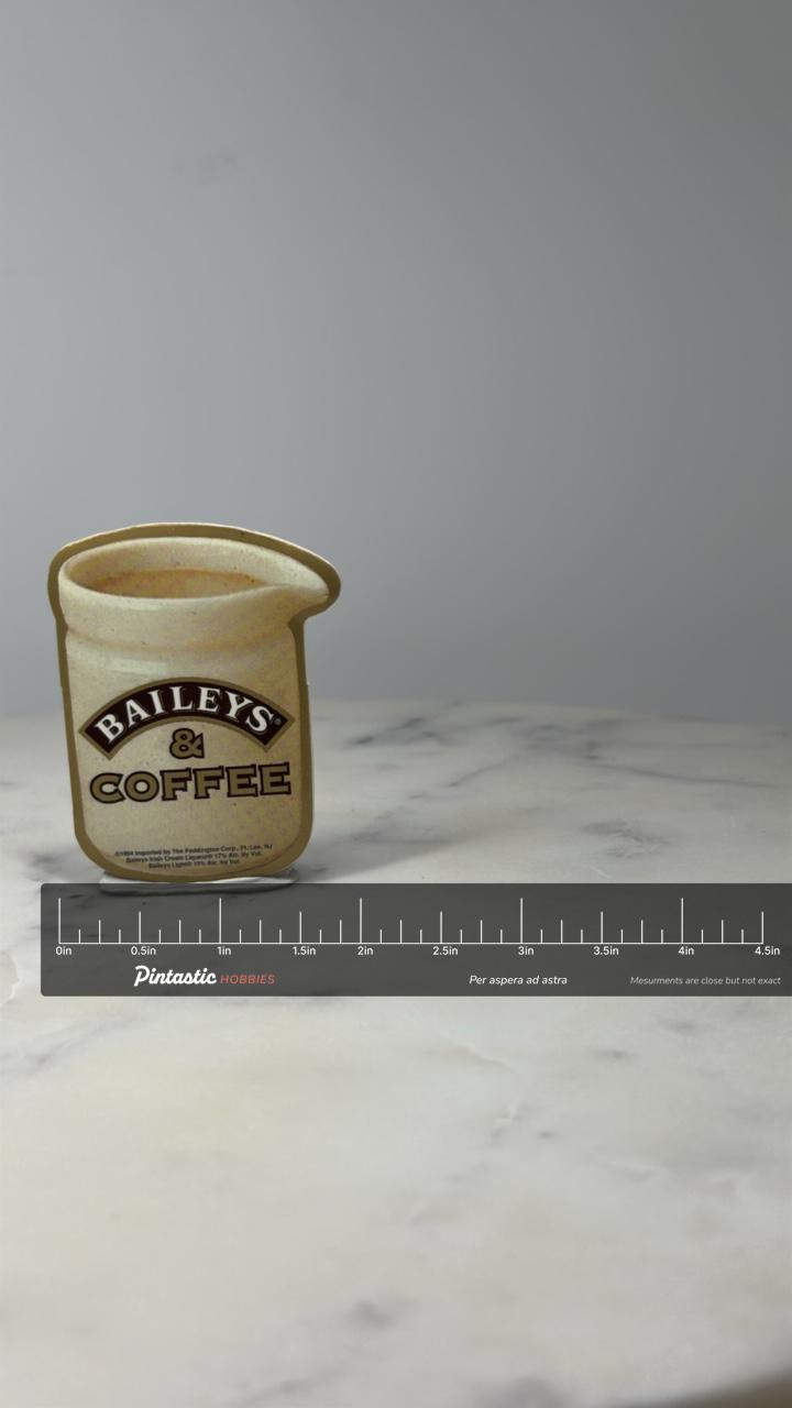 Baileys Coffee Cup Pin: Cream Button - 1990s Bar Accessory with ruler overlay for size reference