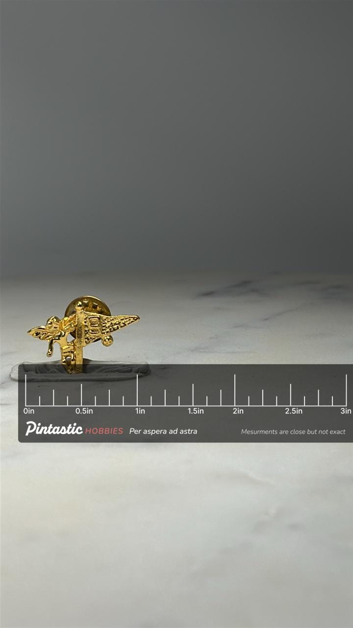 Vintage Cherub Golf Pin Hole 9 Flag Angel Golf Enamel Lapel Pin with ruler overlay for size reference