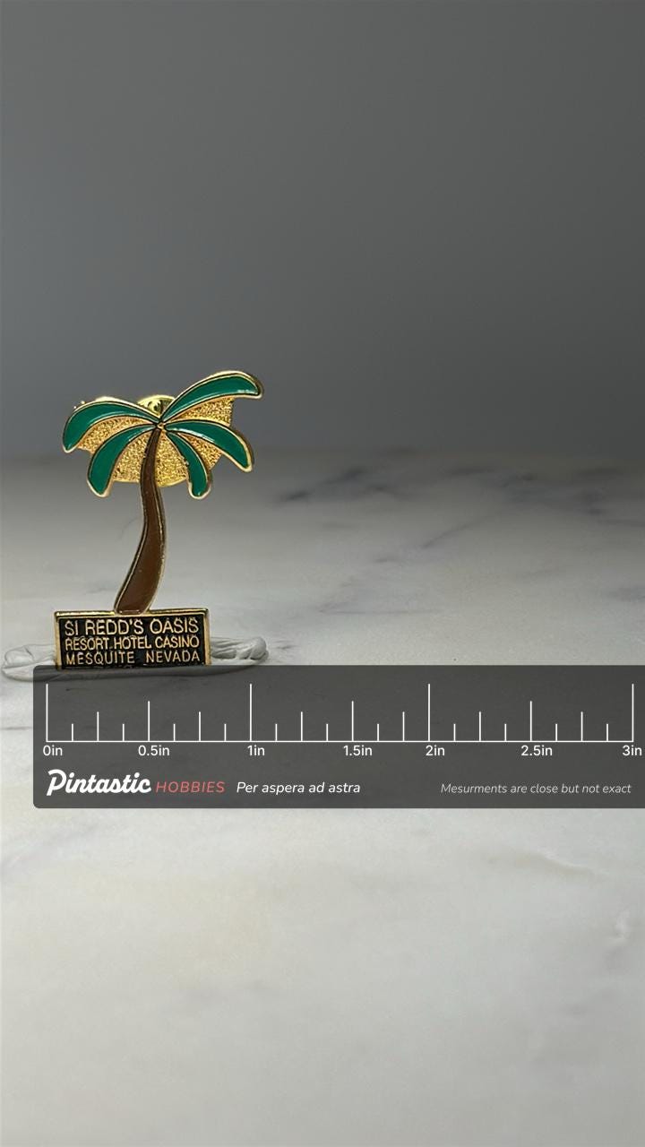 Si Redds Oasis Palm Tree Pin: Gold Enamel - Nevada Casino Souvenir with ruler overlay for size reference