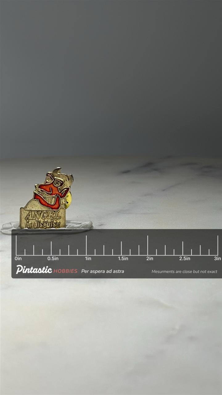 Angel in Disguise Devil Pin Vintage Novelty Enamel Lapel Pin with ruler overlay for size reference