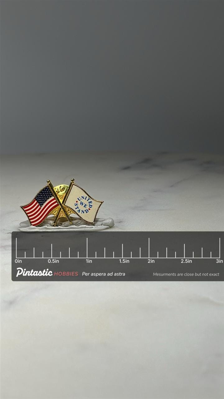 United We Stand Flag Lapel Pin: Gold Tone Enamel - Patriotic Accessory with ruler overlay for size reference