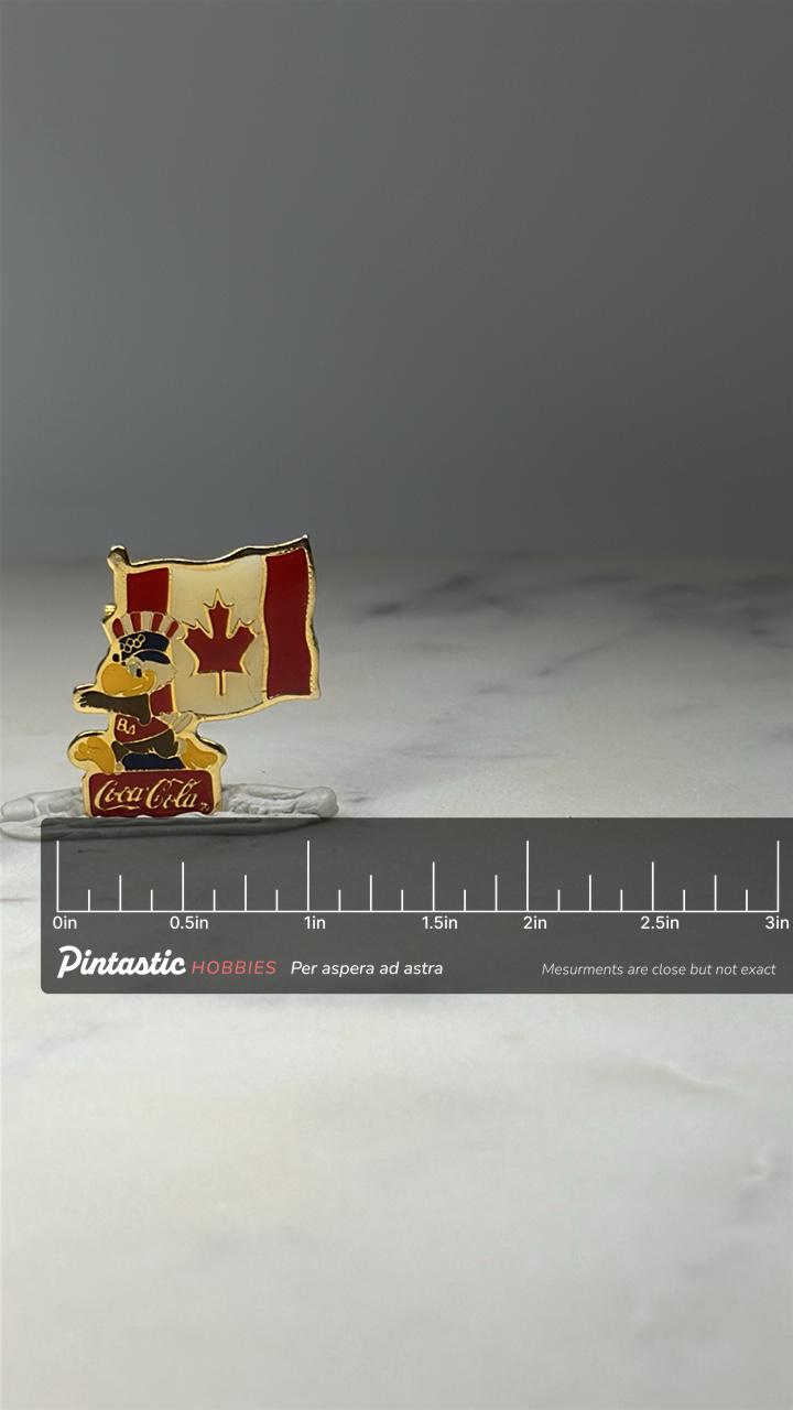 Canada Flag Coca Cola Pin: Gold Tone Enamel - Olympic Era Accessory with ruler overlay for size reference