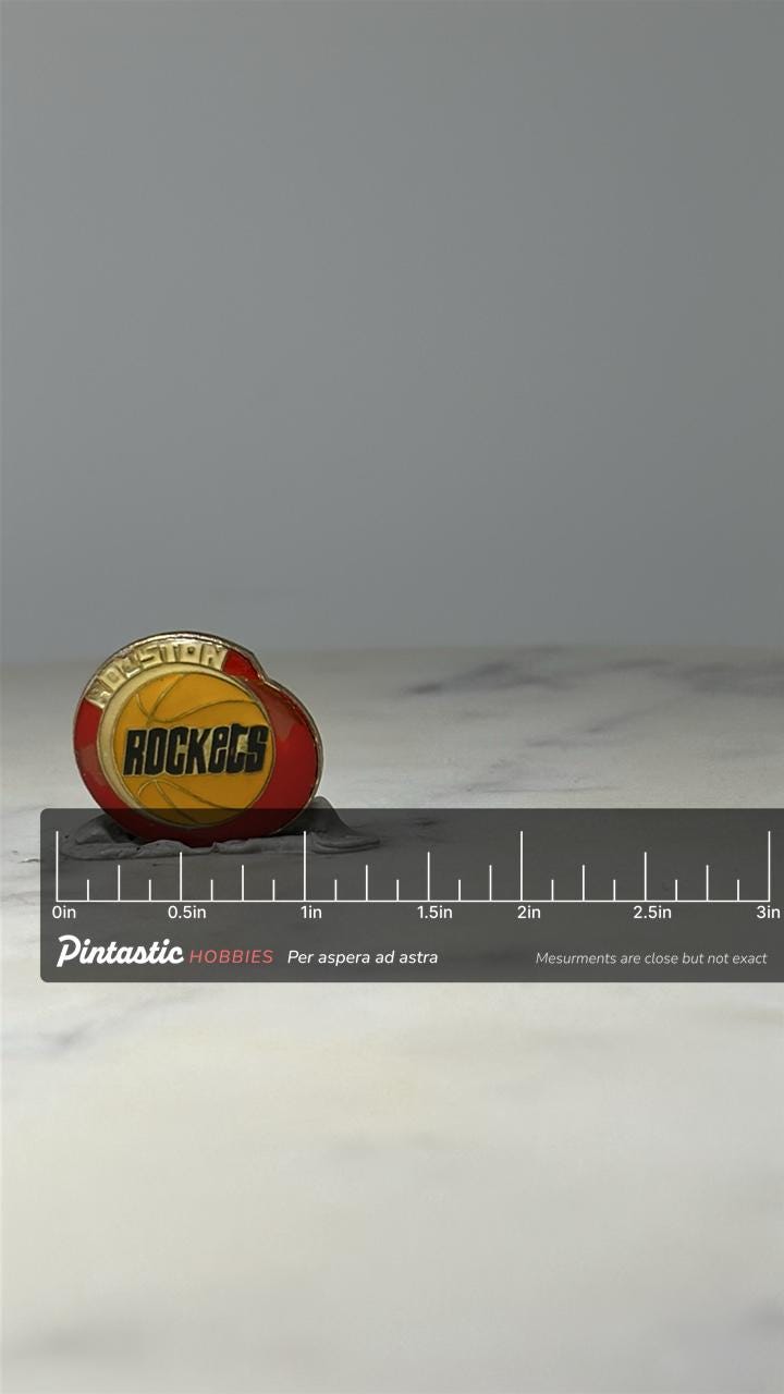 Houston Rockets Basketball Pin: Red & Gold Enamel - Vintage NBA Accessory with ruler overlay for size reference