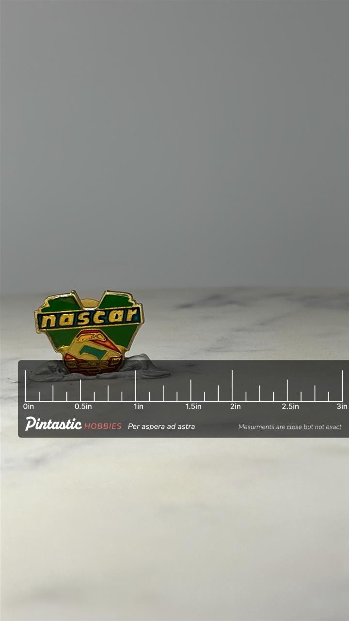 NASCAR Racing Lapel Pin: Green Enamel Gold Tone - Vintage Motorsports Accessory with ruler overlay for size reference