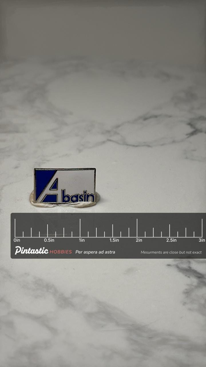 Abasin Company Logo Pin: Blue & White Enamel - Corporate Accessory with ruler overlay for size reference