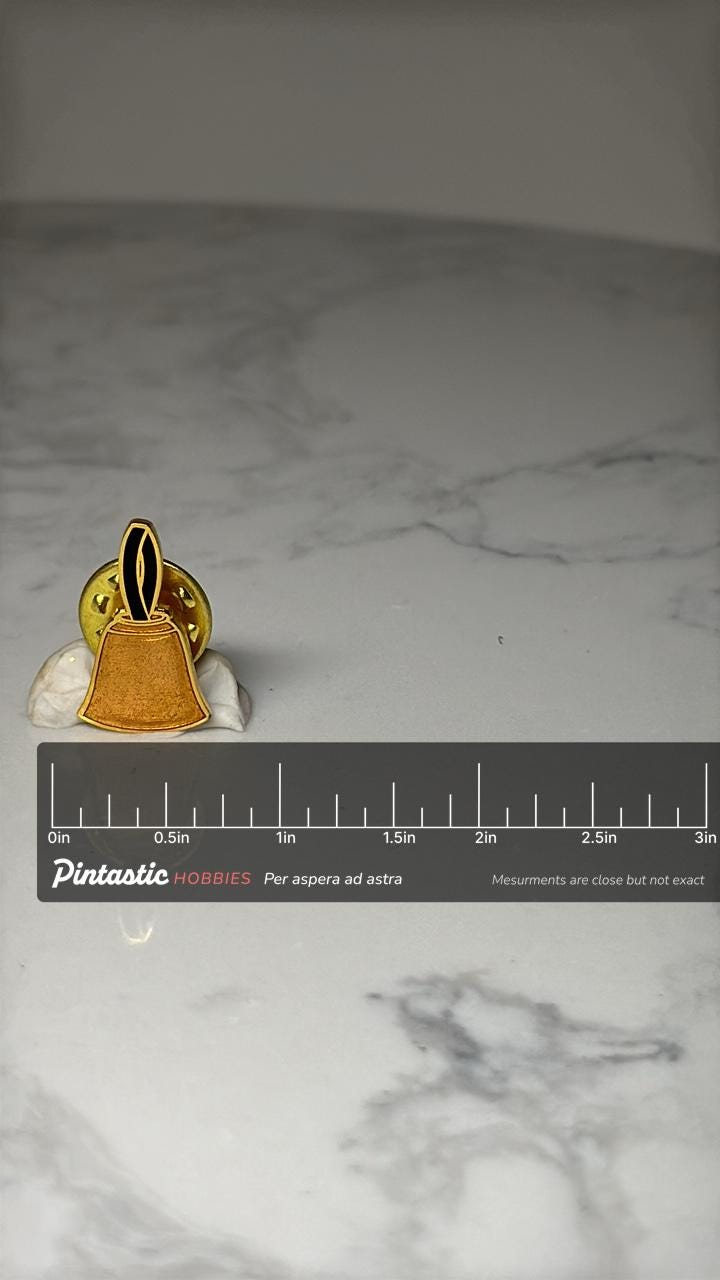 Bell Collectible Pin: Gold Tone Orange Enamel - Retro Accessory with ruler overlay for size reference