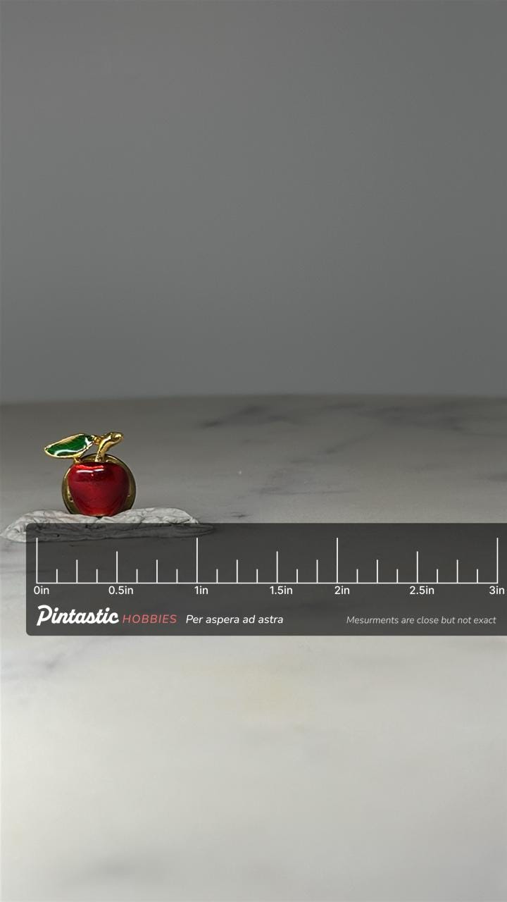 Red Apple Lapel Pin: Gold Tone Enamel - Retro Fruit Accessory with ruler overlay for size reference