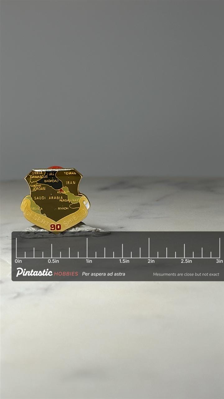 Desert Shield 90 Military Map Pin: Gold Tone Enamel - Gulf War Era Accessory with ruler overlay for size reference