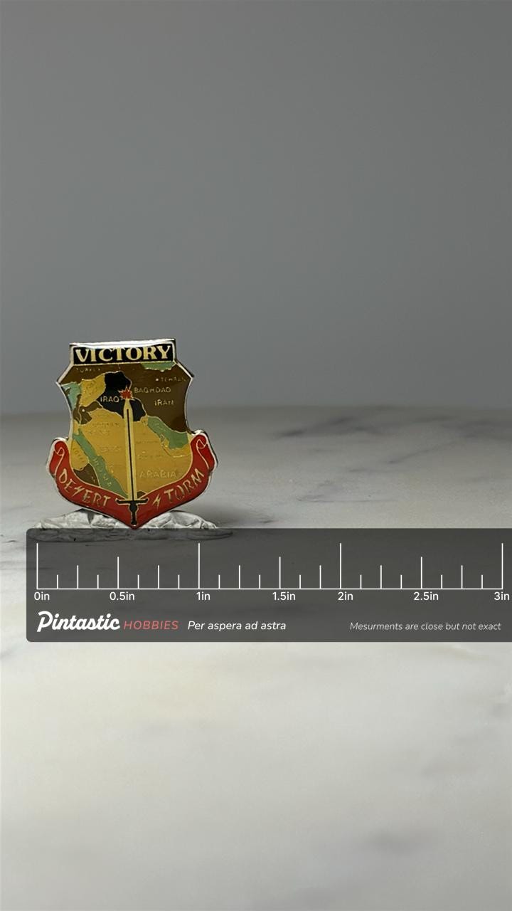 Operation Desert Storm Victory Shield Pin: Enamel - Gulf War Era Accessory with ruler overlay for size reference