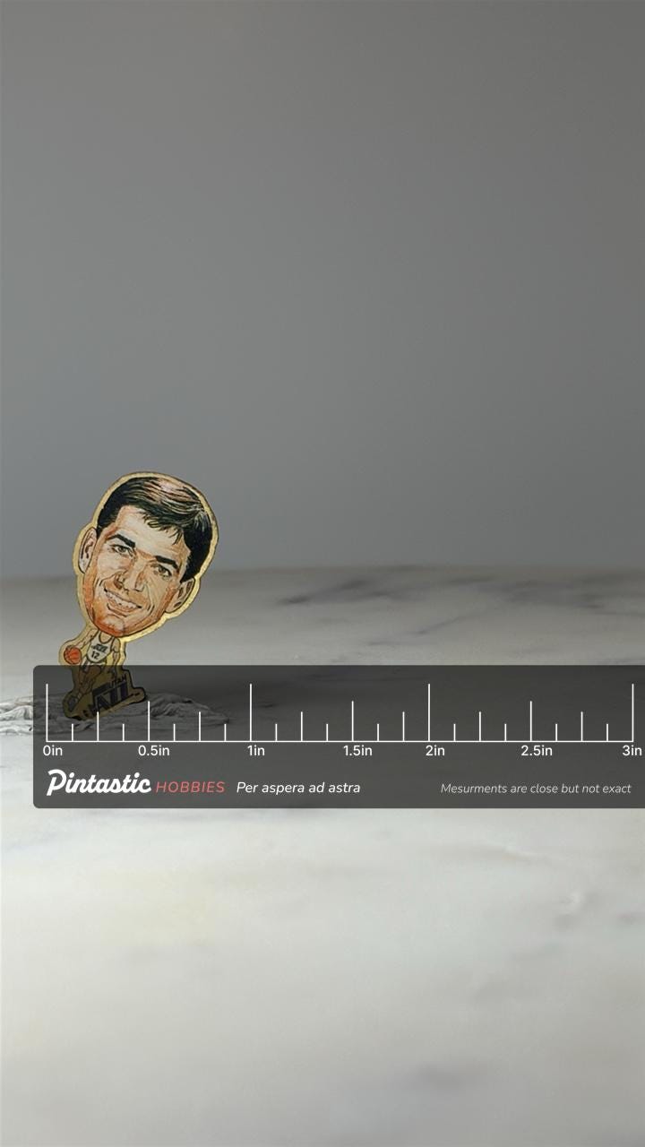 Vintage John Stockton Pinheads Pin: Utah Jazz NBA Lapel Pin – 90s Basketball Collectible with ruler overlay for size referenc