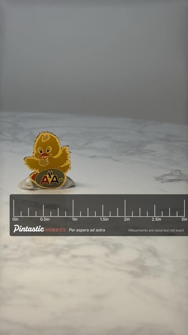 Vintage American Airlines Chick Lapel Pin: Yellow Enamel - Airline Memorabilia Hat Pin with ruler overlay for size reference
