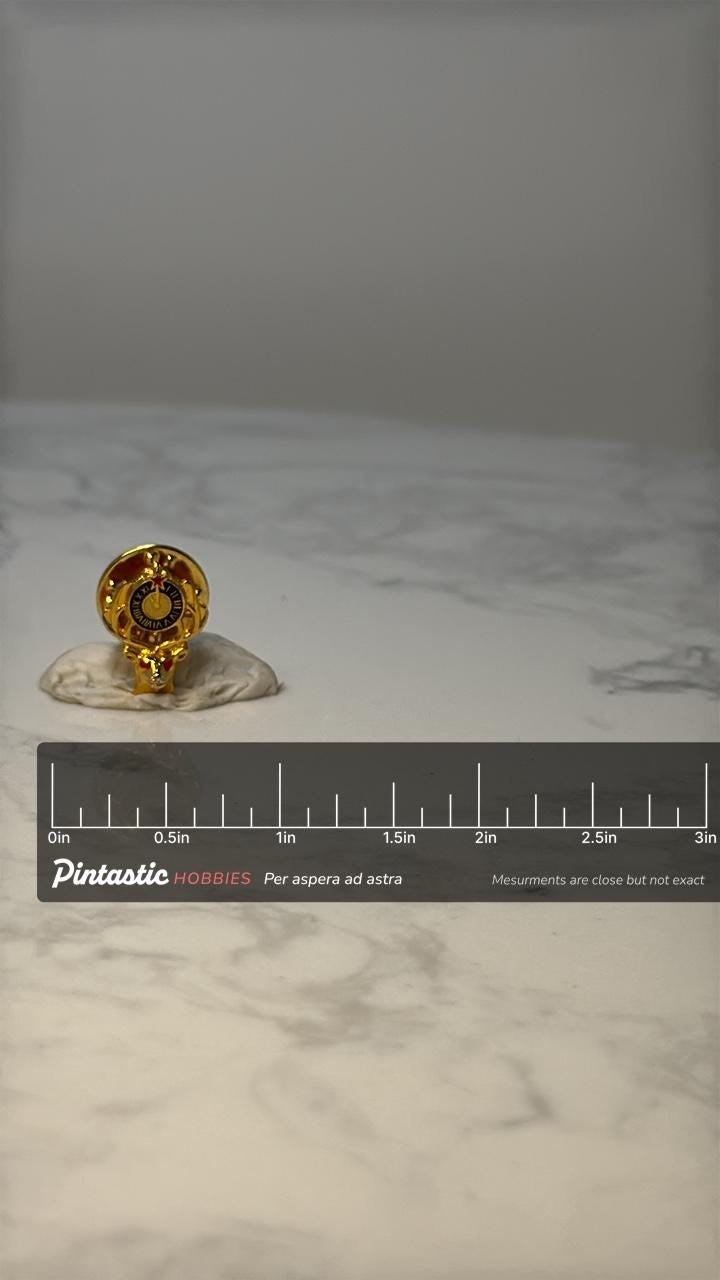 Vintage BPOE Elks Tie Tack Pin: Gold Tone - Fraternal Lodge Memorabilia with ruler overlay for size reference