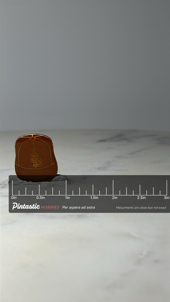 Vintage San Diego Padres Baseball Hat Pin: Brown Enamel - MLB Sports Accessory with ruler overlay for size reference