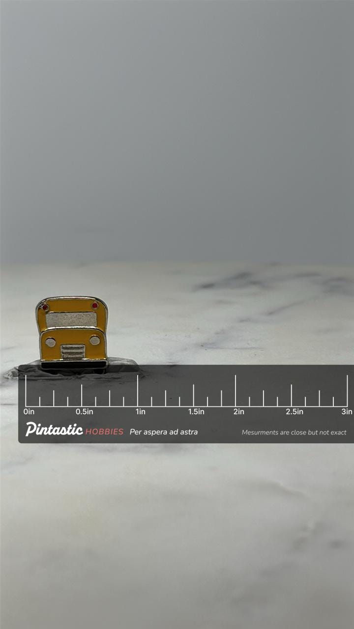 Vintage School Bus Enamel Pin: Yellow & Silver - Retro Transport Accessory with ruler overlay for size reference