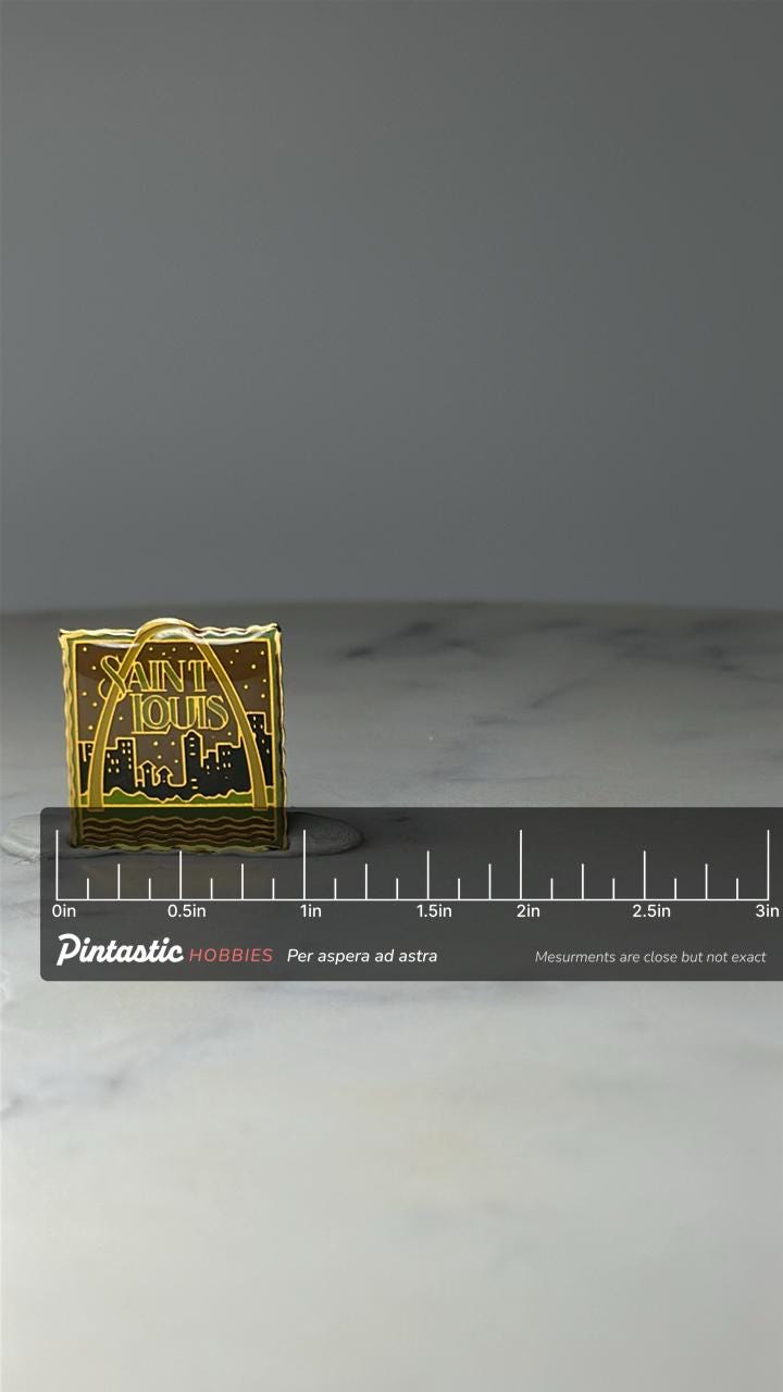 Vintage Saint Louis Souvenir Pin: Gold Tone Enamel - City Skyline Accessory with ruler overlay for size reference